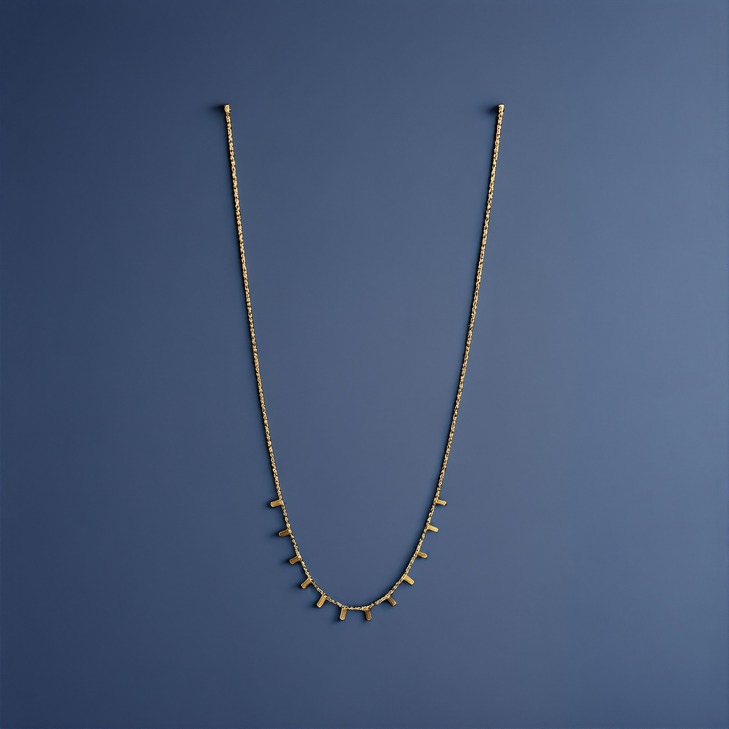 Gold Chain with Vertical Bar Droplets